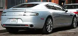 Rear three-quarters view of a silver 2010 Rapide.