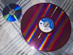 A Recordable Laser Videodisc with a DVD-R for size comparison