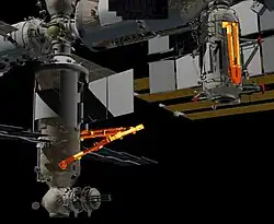 The European Robotic Arm is shown on the left attached to Nauka, the spare elbow joint with 2 limbs is shown on the right, attached to Rassvet