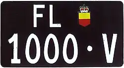 Former rental car license plate, issued between 1977 and 2001.