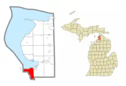 Location within Emmet County (red) and an administered portion of the Bay Shore community (pink)