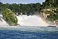 The Rhine Falls and Rheinfallfelsen seen from the Rhine