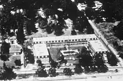 The Richeliu Apartments are shown largely in tact before Camille