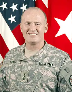 2010 color head and shoulders photo of Lieutenant General Rick Lynch in Army Universal Camouflage pattern uniform