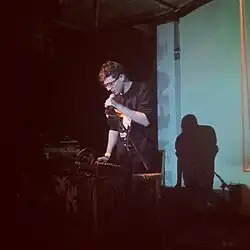 Ray performing as Ricky Eat Acid in 2015