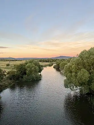 View north-east along Clyde River in Bothwell, Tasmania