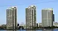 Riverfront Apartments & Condominiums, which have parkland between each building.