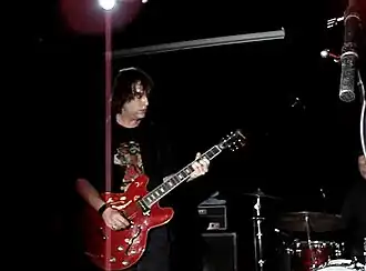 Robert Roth performing with Truly in 2008
