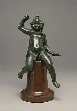 Figure of wingless Eros; 20–60 AD; cast bronze and silver inlay; 17.2 × 9.5 × 6.8&nbsp;cm; Walters Art Museum
