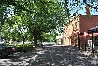 A service lane parallel to Main Street in Romsey