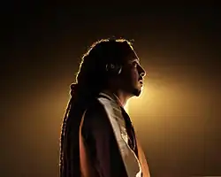 Rophnan performing at a concert in Kampala, Uganda