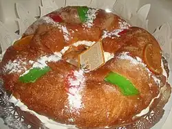 A roscón de reyes from Castellón with whipped cream