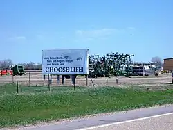 Billboard and farmland in Roscoe, May 2007