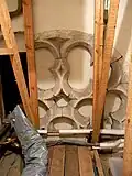 Remains of late C13-early C14 rose window, Edge Barton, featuring a trefoil arch. The wall is thought to have formed the west wall of a late C13-early C14 chapel[24]