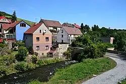 Houses on the left bank of the Bílina river