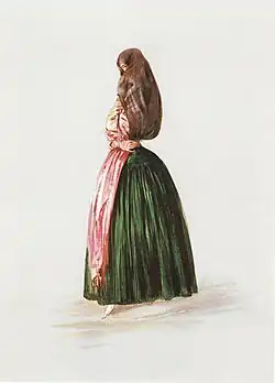 A painting of a woman wearing a traditional Manila shawl shows her wrapped in a pink and brown mantón, with a dark green skirt and her face partly covered