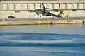 An AH-64 Apache of the Hellenic Army Aviation flying a few meters above the sea level in the harbour of Kavala (2013 AirSea Show)