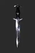 The SS-Ehrendolch, ordnance dagger of the SS, with Meine Ehre heißt Treue inscription acid etched on the blade.