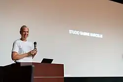 Sabine Marcelis in Tokyo in August 2023 on stage at the University of Tokyo delivering a lecture about her work for the Craft x Tech lecture series.