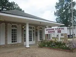 Saline houses a branch of the Sabine State Bank.