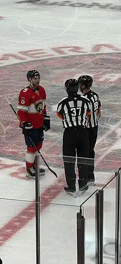 Sam Bennett talks to the referees during a Florida Panthers game against the Vancouver Canucks in November 2025