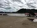 Sam Liam Kham checkpoint pier, with Ban Sop Ruak in Thailand visible across the Mekong River