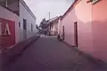 Streetscene. Traditional Spanish colonial houses face into a courtyard/garden for security reasons.