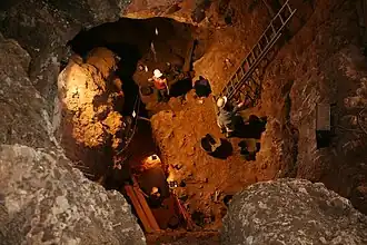 Image 17Archaeologists prospecting Santa Ana Cave at Excavation (archaeology), by Mario modesto (from Wikipedia:Featured pictures/Sciences/Others)