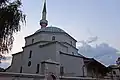 The main building, dome and minaret from Konak street, after 2020