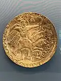 Sassanian plate depicting figure wearing a jamāg with a curved hem