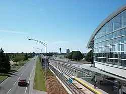 Sea Island Centre station and Grant McConachie Way, with airport control tower visible in the distance