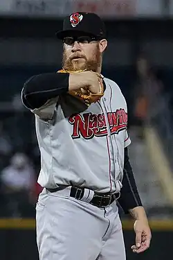 Sean Doolittle with his right elbow up, preparing to pitch for the Nashville Sounds