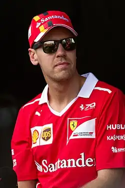 portrait of Sebastian Vettel wearing sunglasses