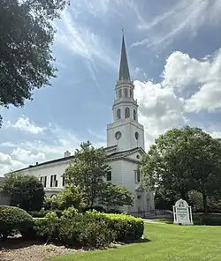 A color photograph of a church building