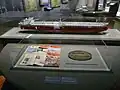 Mockup for a merchant ship built by Hyundai, and the company's magazines