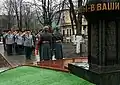 Russian military leaders saluting a monument commemorating the GRU