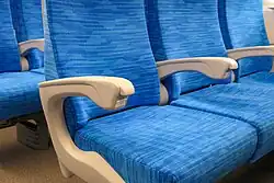 Power outlets on seat armrests