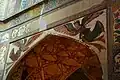 The baths feature frescoes depicting winged angels