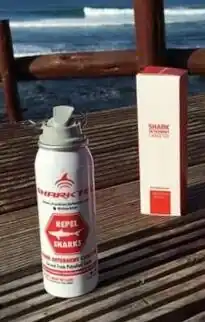 Spray canister on a wooden table