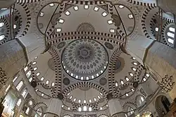 The Şehzade Mosque (1543–8) combines a central dome supported by four pillars and four semi-domes.[101]