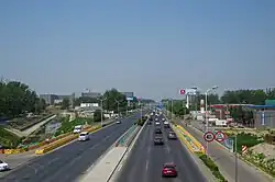 Shunping Highway that passes through the town, 2017