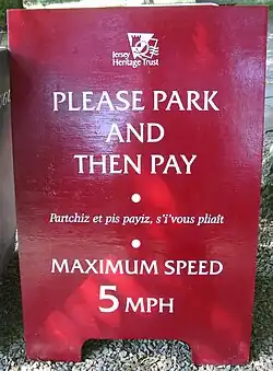 Bilingual signage, with English displayed more prominently than Jèrriais