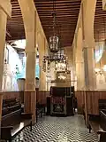 Main hall of the synagoguem with the tevah in the center
