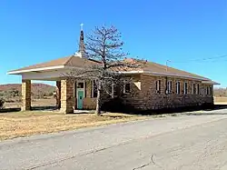 Railroad depot at Slick, later a church and now the Town Hall
