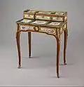 Small writing desk (bonheur-du-jour) by Martin Carlin at the Met Museum, dated to 1768