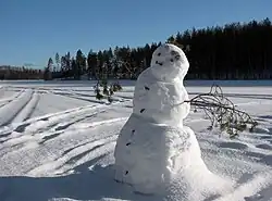 Snowman on a frozen Lake Saimaa in Puumala, South Savo, Finland