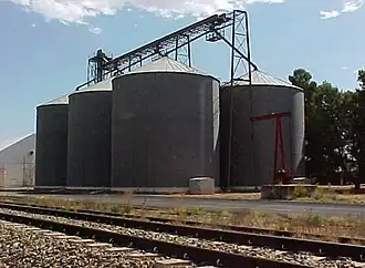 Grain silos beside railway track at Snowtown
