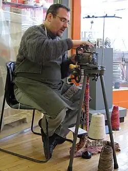 A sock-knitting machine in use