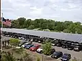 Solar panel canopies over parking lots