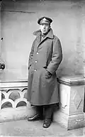 A British soldier wearing his Army-issue greatcoat during World War I